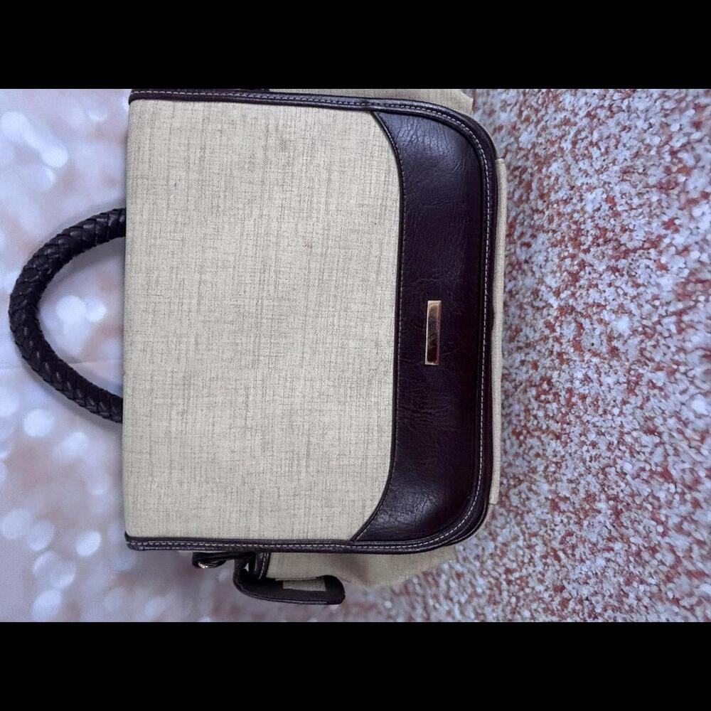 Stylish Beige and‎ Brown AVON Handbag with Multiple Compartments